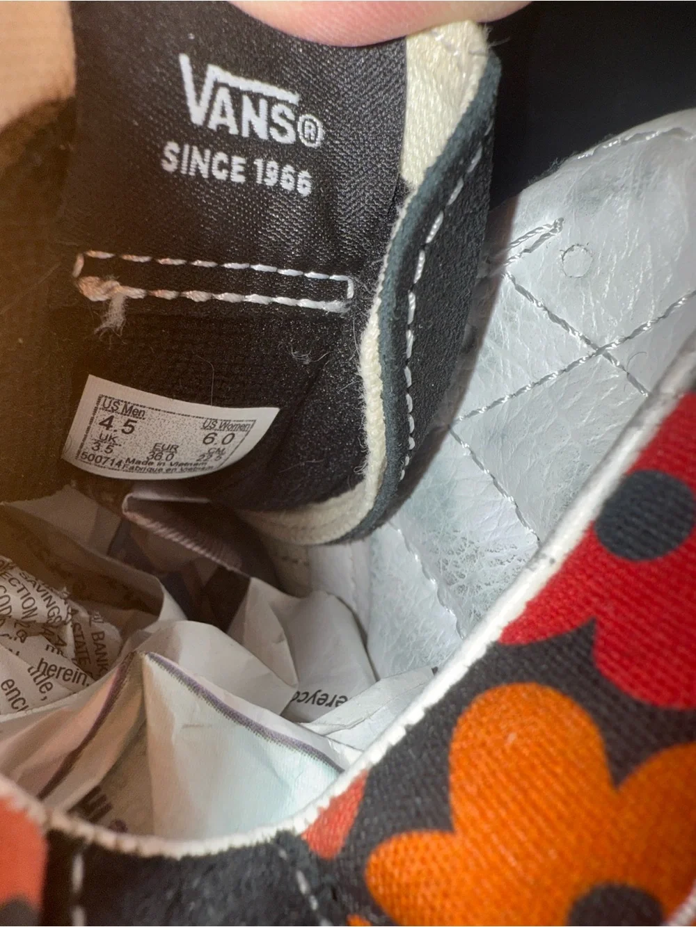 Vans Men 4.5 or Woman’s 6 High-Top Sneakers in Black with Multicolor Hearts.